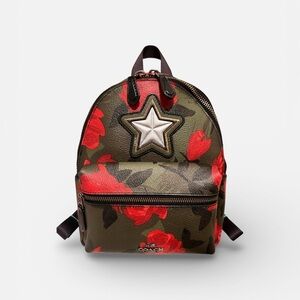 coach camo rose backpack Signature Crossbody 35L Traditional Backpack 17in (43cm) x 12in (30cm) Compartment Area Realtree Jumbo Logo Patch Included Realtree Antler Top Patch Included Mini Realtree Shoulder Strap Patch Included Dual Cup Holders (Shakers NOT Included) Protective Inside Computer Pouch 10in x 10in Fits Carry On Regulations Overhead Compartment YKK Japanese Upgraded Two Way Water Resistant Zippers 180 Degree Opening for easy packing Waterproof Surface Oxford 1000D Polyester Load Test up to 35lbs Coach Green Backpacks for Women